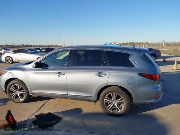 2019 Infiniti QX60 LUXE with VIN 5N1DL0MN1KC520817, listed as a IAAI auction lot 40931500 with 62,926 mi miles. Bid and sale history available at carsss.com. Image 14.