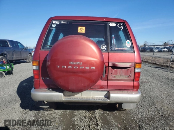 1999 Isuzu Trooper S with VIN JACDJ58X7X7931091, listed as a Copart auction lot 44824285 with Not provided miles and Salvage title. Bid and sale history available at DreamBid. Image 6.