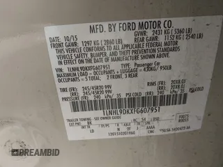 2015 Lincoln MKS with VIN 1LNHL9DKXFG607951, listed as a IAAI auction lot 40807752 with 207,097 mi miles. Bid and sale history available at carsss.com. Image 9.