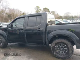2014 Nissan Frontier SV with VIN 1N6AD0ER9EN715608, listed as a IAAI auction lot 41306919 with 181,107 mi miles and . Bid and sale history available at DreamBid. Image 14.