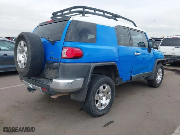 2007 Toyota FJ Cruiser with VIN JTEBU11F670061350, listed as a IAAI auction lot 41906476 with 253,650 mi miles. Bid and sale history available at carsss.com. Image 4.