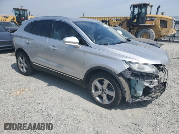 2017 Lincoln MKC Premiere z VIN 5LMCJ1C95HUL11303, wystawiony jako Copart lot #58263945 z przebiegiem 82 628 mil mil oraz Szkoda całkowita • Salvage title. Historia ofert i sprzedaży dostępna na DreamBid. Obrazek 4.
