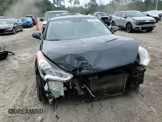 2014 Hyundai Veloster z VIN KMHTC6AD8EU193177, wystawiony jako Copart lot #55472315 z przebiegiem 90 633 mil mil oraz Szkoda całkowita • Salvage title. Historia ofert i sprzedaży dostępna na DreamBid. Obrazek 14.