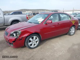 2007 Kia Optima LX with VIN KNAGE124575112468, listed as a IAAI auction lot 41816122 with 177,880 mi miles. Bid and sale history available at carsss.com. Image 2.