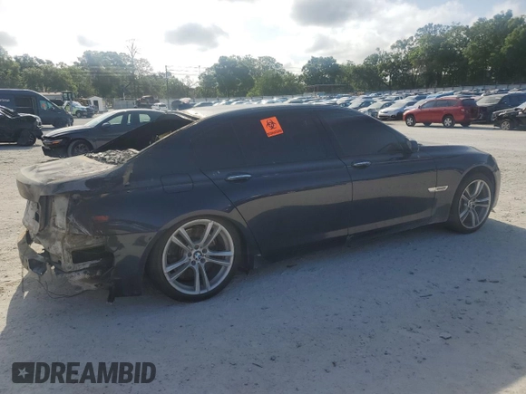 2011 BMW 7 Series 750Li z VIN WBAKB8C52BCY65687, wystawiony jako Copart lot #52441335 z przebiegiem Nie podano mil oraz Nie do naprawy • Non repairable. Historia ofert i sprzedaży dostępna na DreamBid. Obrazek 3.