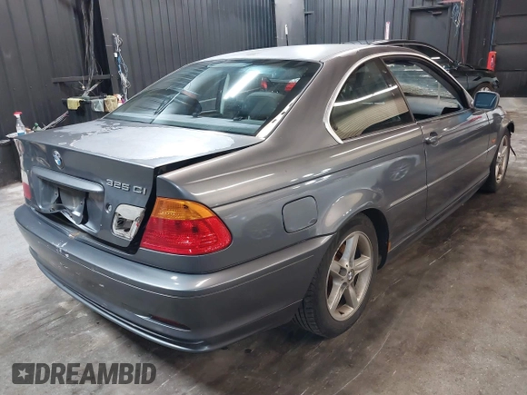 2001 BMW 3 Series 325Ci with VIN WBABN33471JW48292, listed as a IAAI auction lot 41557412 with 118,000 mi miles. Bid and sale history available at carsss.com. Image 4.