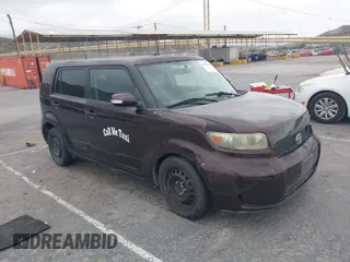 2009 Scion xB with VIN JTLKE50E291081243, listed as a IAAI auction lot 42033327 with 263,903 mi miles. Bid and sale history available at carsss.com. Image 1.