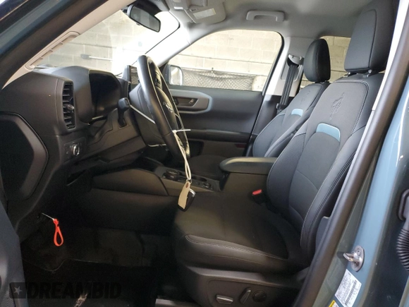 2022 Ford Bronco Sport Badlands z VIN 3FMCR9D92NRE21849, wystawiony jako Copart lot #56589985 z przebiegiem Nie podano mil oraz Szkoda całkowita • Salvage title. Historia ofert i sprzedaży dostępna na DreamBid. Obrazek 7.