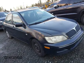 2003 Mitsubishi Lancer ES with VIN JA3AJ26E83U006060, listed as a IAAI auction lot 41254660 with 220,490 mi miles. Bid and sale history available at carsss.com. Image 1.