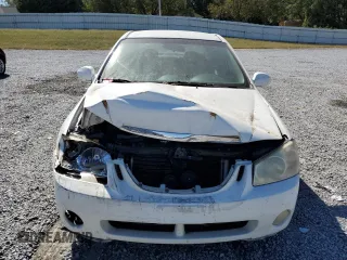 2005 Kia Spectra LX with VIN KNAFE121055167652, listed as a Copart auction lot 72753994 with Not Provided miles and Salvage Title. Bid and sale history available at carsss.com. Image 5.