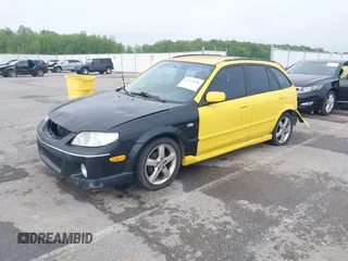 2003 Mazda Protege z VIN JM1BJ245631111660, wystawiony jako IAAI lot #42155636 z przebiegiem 243 453 mil mil oraz . Historia ofert i sprzedaży dostępna na DreamBid. Obrazek 2.