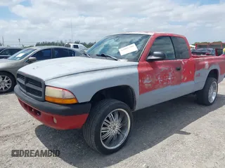 2002 Dodge Dakota Sport with VIN 1B7GL32X82S632091, listed as a IAAI auction lot 42091290 with 206,721 mi miles and . Bid and sale history available at carsss.com. Image 2.