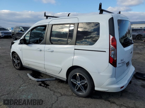 2016 Ford Transit Connect XLT with VIN NM0AE8F7XG1234396, listed as a Copart auction lot 83246404 with 82,787 mi miles and Salvage title. Bid and sale history available at DreamBid. Image 2.