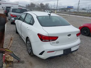 2021 Kia Rio LX with VIN 3KPA24AD3ME400283, listed as a IAAI auction lot 41495331 with 84,920 mi miles. Bid and sale history available at carsss.com. Image 3.