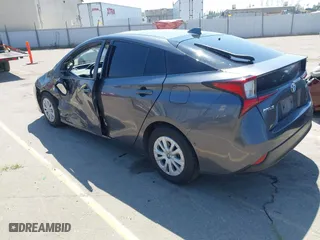 2022 Toyota Prius L Eco with VIN JTDKAMFU5N3160694, listed as a IAAI auction lot 41874909 with 80,376 mi miles. Bid and sale history available at carsss.com. Image 3.