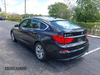 2011 BMW 5 Series GT 535i xDrive with VIN WBASP2C50BC337015, listed as a IAAI auction lot 42209500 with 136,961 mi miles. Bid and sale history available at carsss.com. Image 3.