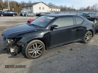 2016 Scion tC with VIN JTKJF5C79GJ018910, listed as a Copart auction lot 43444515 with 120,884 mi miles and Salvage Title. Bid and sale history available at carsss.com. Image 1.