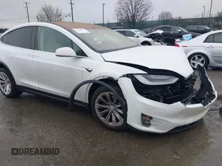 2019 Tesla Model X 75D with VIN 5YJXCDE27KF184980, listed as a IAAI auction lot 41476564 with 125,808 mi miles. Bid and sale history available at carsss.com. Image 1.