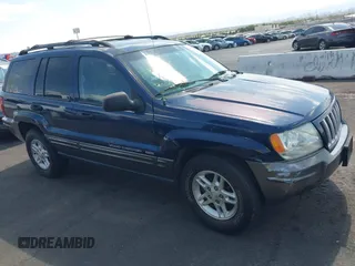 2004 Jeep Grand Cherokee with VIN 1J4GX48J74C283123, listed as a IAAI auction lot 42477393 with 182,491 mi miles and . Bid and sale history available at DreamBid. Image 12.