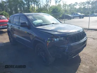 2018 Jeep Grand Cherokee Altitude with VIN 1C4RJFAG7JC394051, listed as a IAAI auction lot 42492771 with 147,669 mi miles and . Bid and sale history available at DreamBid. Image 1.