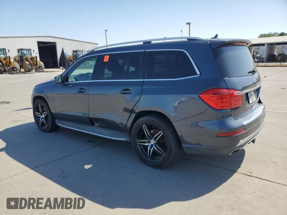 2014 Mercedes-Benz GL 450 with VIN 4JGDF7CE1EA278029, listed as a Copart auction lot 55501885 with 143,250 mi miles and Salvage title. Bid and sale history available at DreamBid. Image 2.
