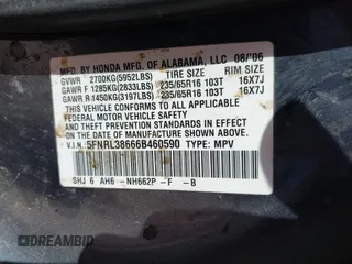 2006 Honda Odyssey EX-L with VIN 5FNRL38666B460590, listed as a IAAI auction lot 41998373 with 266,486 mi miles and . Bid and sale history available at carsss.com. Image 9.