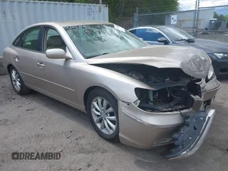 2006 Hyundai Azera SE z VIN KMHFC46FX6A125848, wystawiony jako IAAI lot #42195041 z przebiegiem 147 596 mil mil oraz . Historia ofert i sprzedaży dostępna na DreamBid. Obrazek 1.