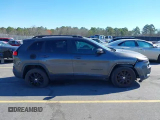 2014 Jeep Cherokee Latitude with VIN 1C4PJMCS3EW298340, listed as a IAAI auction lot 41708488 with 217,438 mi miles and . Bid and sale history available at DreamBid. Image 13.
