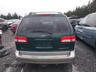 2001 Toyota Sienna LE with VIN 4T3ZF13C91U352296, listed as a IAAI auction lot 41647762 with 262,803 mi miles. Bid and sale history available at carsss.com. Image 16.