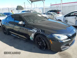 2015 BMW 6 Series 640i with VIN WBA6A0C52FGB53591, listed as a IAAI auction lot 41247695 with 81,828 mi miles and . Bid and sale history available at DreamBid. Image 6.
