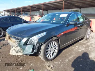 2017 Cadillac CT6 AWD with VIN 1G6KB5RS6HU124768, listed as a IAAI auction lot 41985931 with 119,606 mi miles and . Bid and sale history available at DreamBid. Image 2.