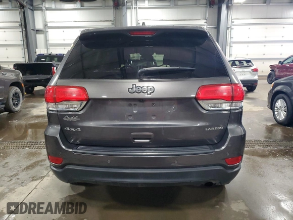 2016 Jeep Grand Cherokee Laredo with VIN 1C4RJFAG2GC317791, listed as a Copart auction lot 51296425 with 188,488 mi miles and Salvage title. Bid and sale history available at DreamBid. Image 6.