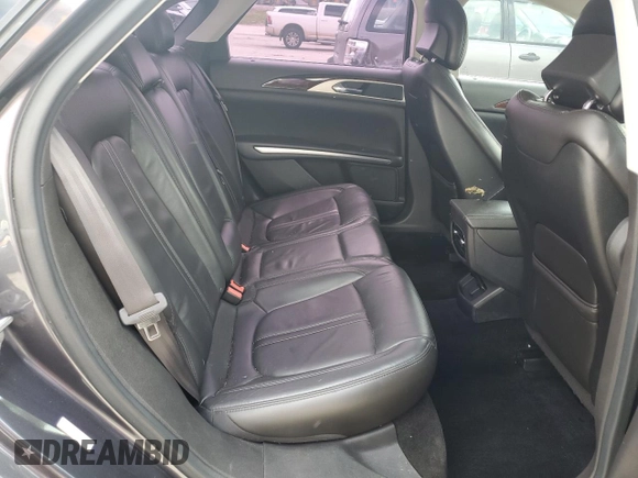2014 Lincoln MKZ z VIN 3LN6L2G97ER822718, wystawiony jako Copart lot #55264075 z przebiegiem 141 738 mil mil oraz Szkoda całkowita • Salvage title. Historia ofert i sprzedaży dostępna na DreamBid. Obrazek 10.