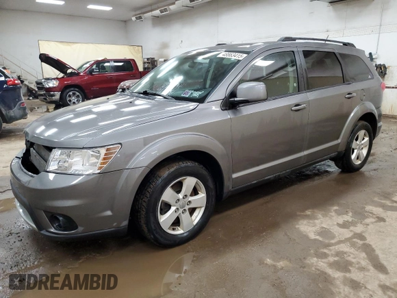 2012 Dodge Journey SXT with VIN 3C4PDCBG1CT353210, listed as a Copart auction lot 48863415 with 122,904 mi miles and Clean title. Bid and sale history available at DreamBid. Image 1.
