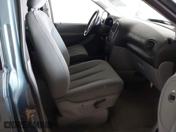 2005 Dodge Caravan SXT with VIN 2D4GP44L25R431882, listed as a IAAI auction lot 42484876 with 242,096 mi miles and . Bid and sale history available at DreamBid. Image 5.