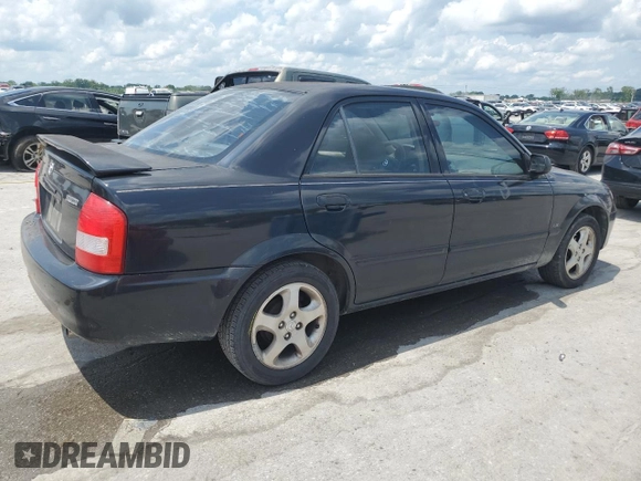 2002 Mazda Protege DX z VIN JM1BJ225020537013, wystawiony jako Copart lot #56952495 z przebiegiem 129 846 mil mil oraz Czysty tytuł • Clean title. Historia ofert i sprzedaży dostępna na DreamBid. Obrazek 3.