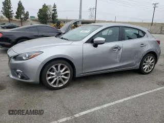 2014 Mazda 3 S Touring z VIN JM1BM1L30E1192840, wystawiony jako Copart lot #58805575 z przebiegiem 170 388 mil mil oraz Szkoda całkowita • Salvage title. Historia ofert i sprzedaży dostępna na DreamBid. Obrazek 1.