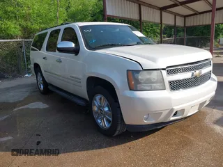 2010 Chevrolet Suburban LTZ with VIN 1GNUKKE38AR251895, listed as a IAAI auction lot 42020123 with 166,130 mi miles. Bid and sale history available at carsss.com. Image 1.