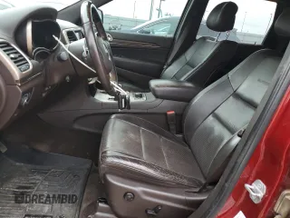 2014 Jeep Grand Cherokee Summit z VIN 1C4RJFJT8EC359165, wystawiony jako Copart lot #57037225 z przebiegiem 163 372 mil mil oraz Szkoda całkowita • Salvage title. Historia ofert i sprzedaży dostępna na DreamBid. Obrazek 7.