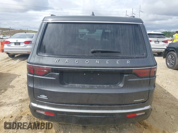 2022 Jeep Wagoneer Series II z VIN 1C4SJVBT1NS160071, wystawiony jako IAAI lot #41630187 z przebiegiem 51 547 mil mil oraz . Historia ofert i sprzedaży dostępna na DreamBid. Obrazek 16.