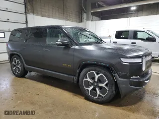 2024 Rivian R1S Adventure with VIN 7PDSGCBA0RN044942, listed as a Copart auction lot 78447784 with 6,731 mi miles and Salvage Title. Bid and sale history available at carsss.com. Image 4.