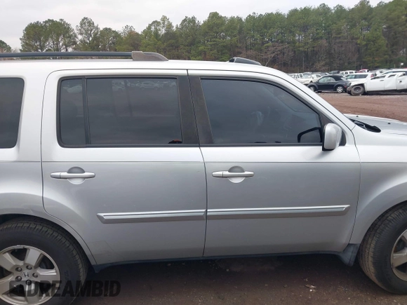 2011 Honda Pilot EX-L with VIN 5FNYF3H6XBB036391, listed as a IAAI auction lot 41100998 with 120,516 mi miles and . Bid and sale history available at DreamBid. Image 13.