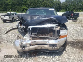 2000 Ford Excursion Limited with VIN 1FMNU42L1YEC61687, listed as a Copart auction lot 67590714 with 219,386 mi miles and Salvage title. Bid and sale history available at DreamBid. Image 5.