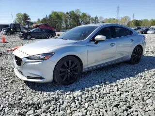 2018 Mazda 6 Grand Touring with VIN JM1GL1TY0J1324994, listed as a Copart auction lot 52306035 with 72,974 mi miles and Salvage Title. Bid and sale history available at DreamBid. Image 1.