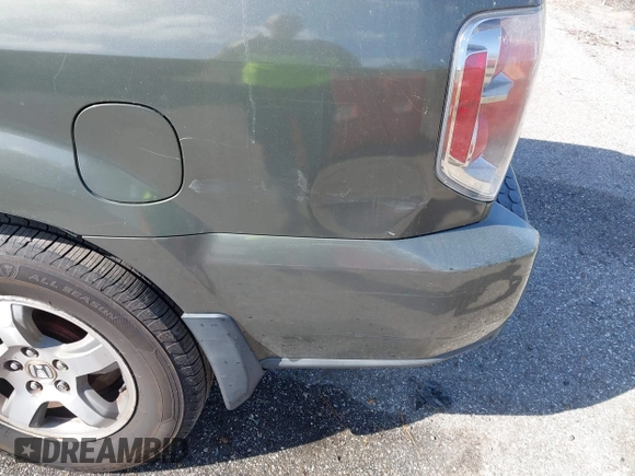 2006 Honda Pilot EX-L with VIN 2HKYF18786H506289, listed as a IAAI auction lot 41507906 with 283,470 mi miles and . Bid and sale history available at DreamBid. Image 6.