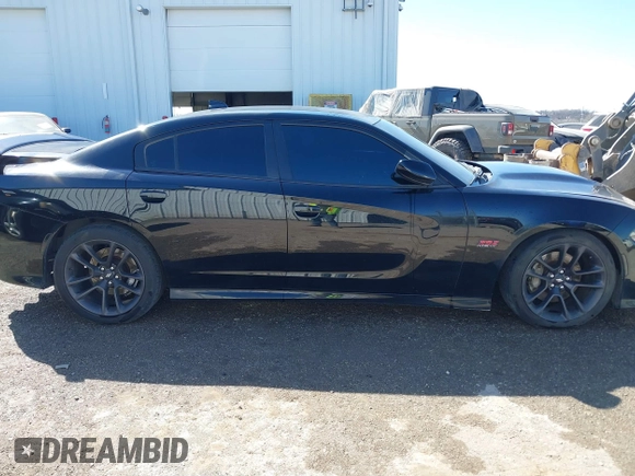 2020 Dodge Charger Scat Pack z VIN 2C3CDXGJ5LH162266, wystawiony jako IAAI lot #41763759 z przebiegiem 83 366 mil mil oraz . Historia ofert i sprzedaży dostępna na DreamBid. Obrazek 13.