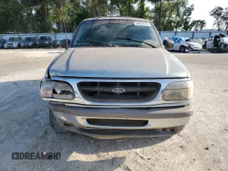 1996 Ford Explorer XL с VIN 1FMDU34X9TZA13792, выставлен на аукционе Copart как лот 58668525 с пробегом 123 231 миль миль и Списание • Salvage title. История ставок и продаж доступна на DreamBid. Изображение 5.