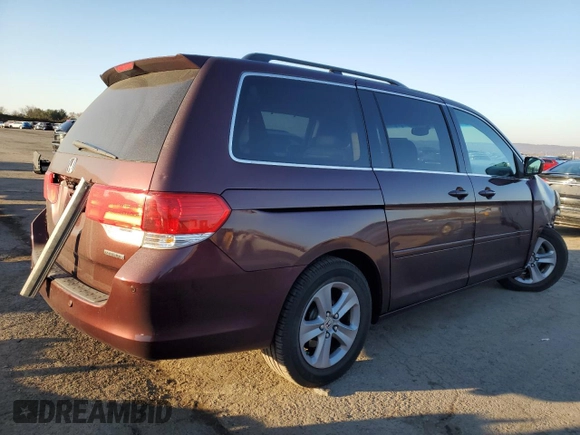 2010 Honda Odyssey Touring with VIN 5FNRL3H93AB086488, listed as a Copart auction lot 48660505 with 190,333 mi miles and Salvage Title. Bid and sale history available at carsss.com. Image 3.