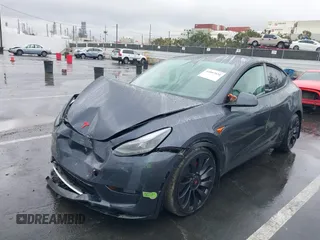 2023 Tesla Model Y Performance with VIN 7SAYGDEF0PF774282, listed as a IAAI auction lot 41807031 with Not Provided miles and . Bid and sale history available at DreamBid. Image 18.