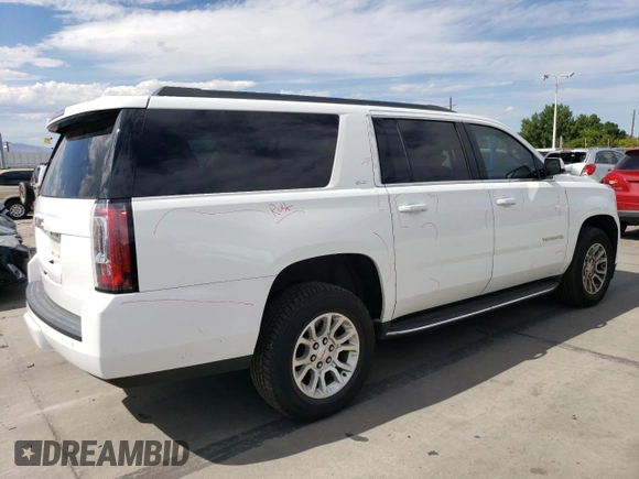 2019 GMC Yukon XL SLT with VIN 1GKS2GKC5KR362816, listed as a Copart auction lot 69062794 with 96,321 mi miles and Salvage Title. Bid and sale history available at DreamBid. Image 3.